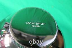 2 Bols George Jensen dont 1 mesure 6 1/4 de large et l'autre mesure 9 1/2 de large.